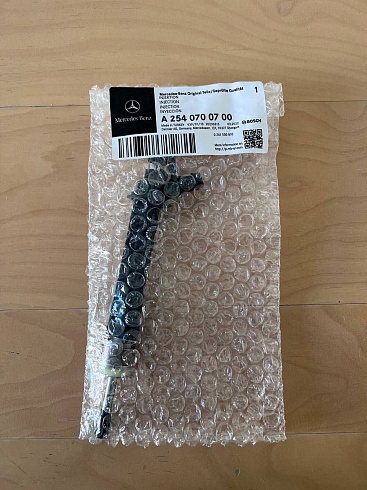 Форсунка топливная Mercedes-Benz A2540700700 (A 254 070 07 00) 0261500810